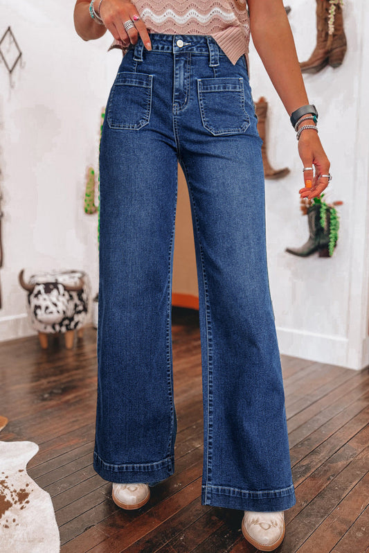 Woman wearing blue jeans and boots. 